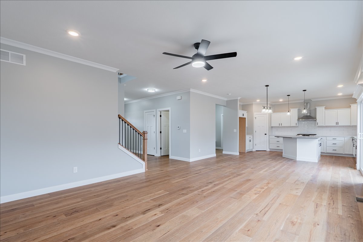 5206 Finlen Lane Bloomington, IL 61705 - Photo 9 of 40 a view of a kitchen with wooden floor and a sink