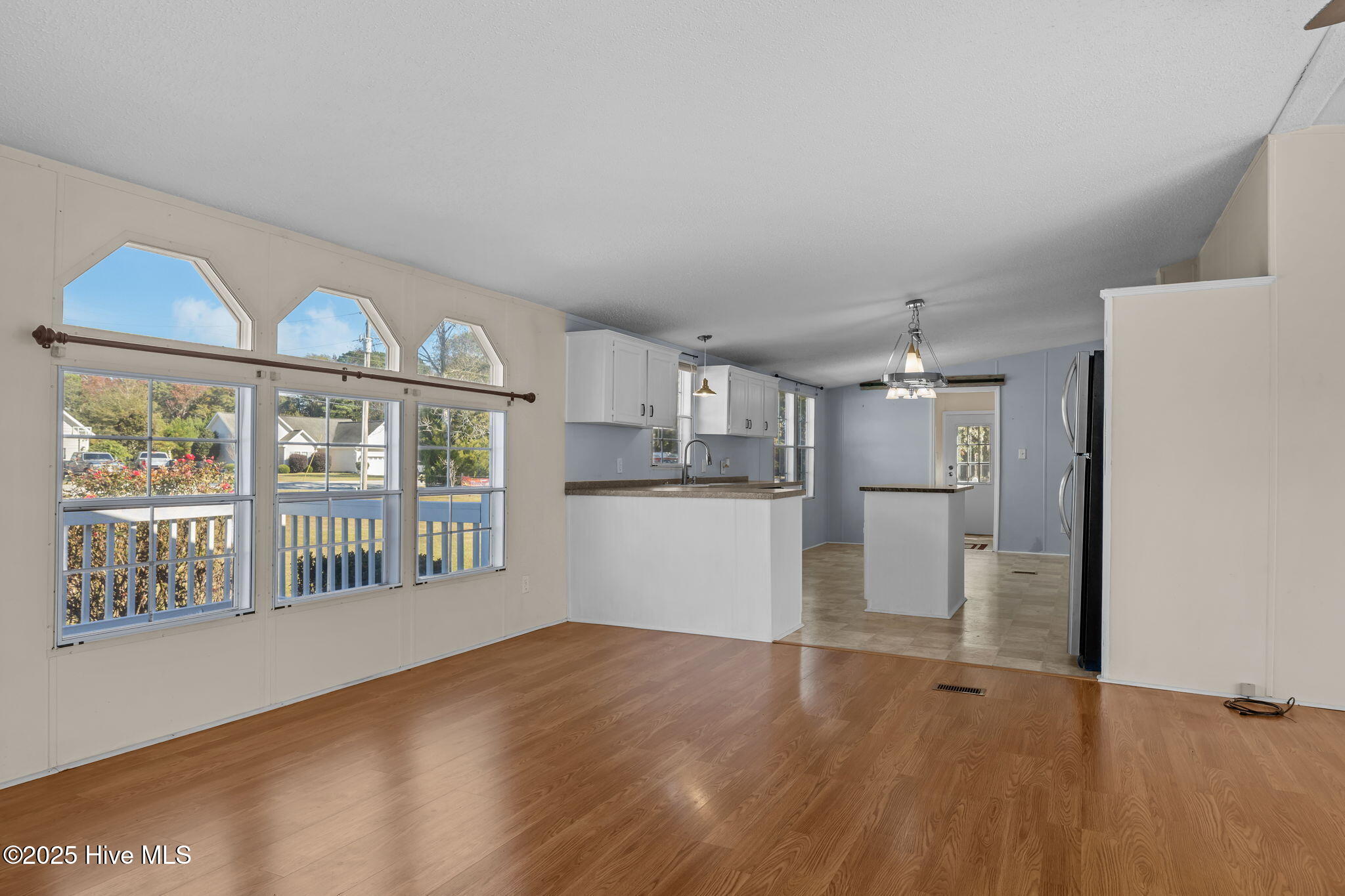 758 Wetherington Landing Road Stella, NC 28582 - Photo 12 of 49 Great room to kitchen
