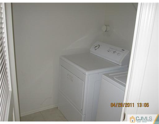 23 Raritan Reach Road South Amboy, NJ 08879 - Photo 11 of 14 a utility room with dryer and washer