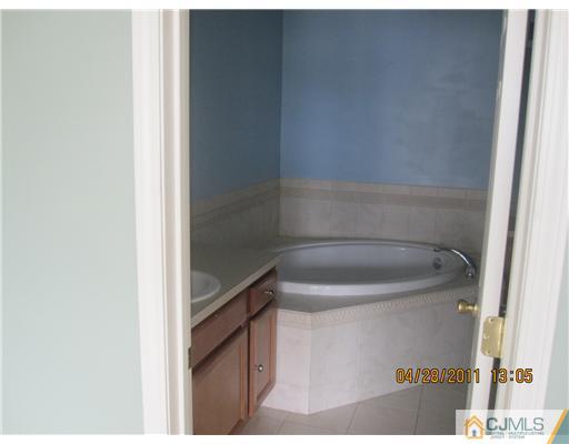 23 Raritan Reach Road South Amboy, NJ 08879 - Photo 8 of 14 a bathroom with a close up view of a sink