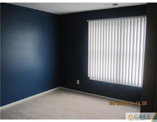 23 Raritan Reach Road South Amboy, NJ 08879 - Photo 9 of 14 a view of an empty room with a window