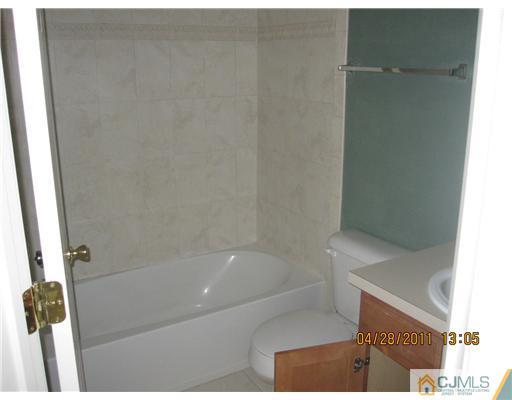 23 Raritan Reach Road South Amboy, NJ 08879 - Photo 10 of 14 a bathroom with a bathtub