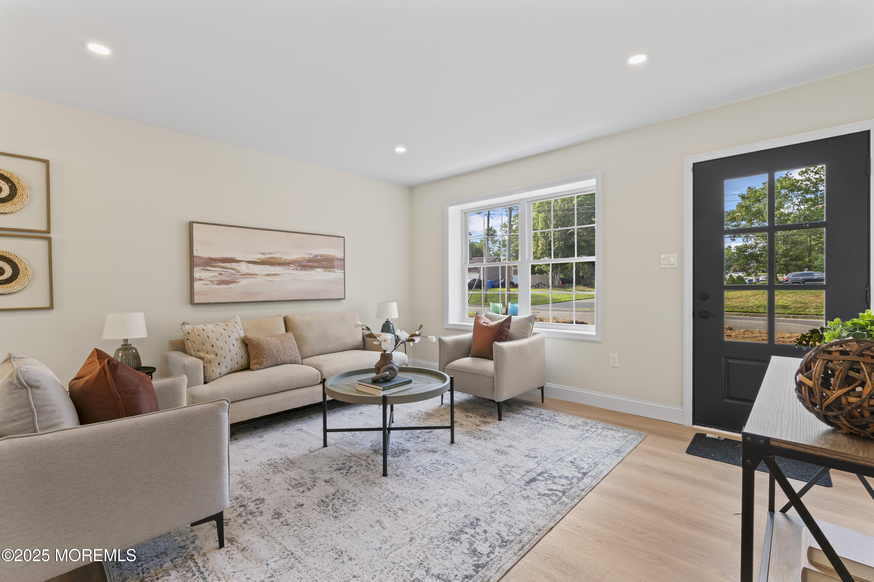 249 Crows Nest Road Manahawkin, NJ 08050 - Photo 4 of 21 a living room with furniture and a window