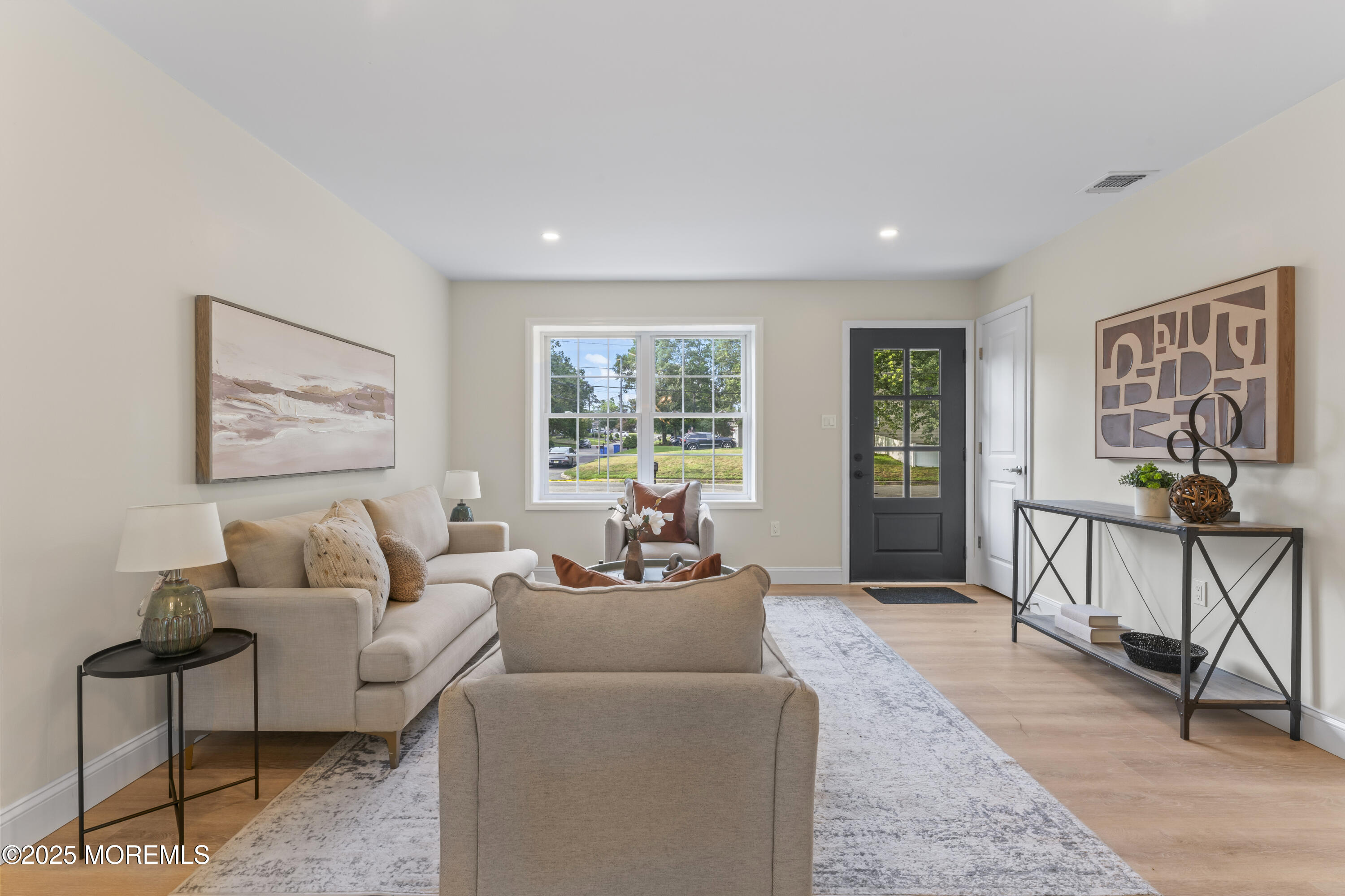 249 Crows Nest Road Manahawkin, NJ 08050 - Photo 5 of 21 a living room with furniture and a window