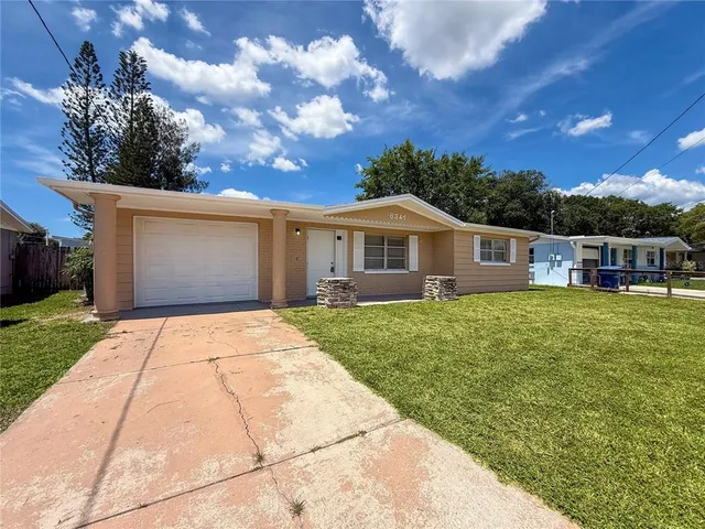 a view of house with outdoor space