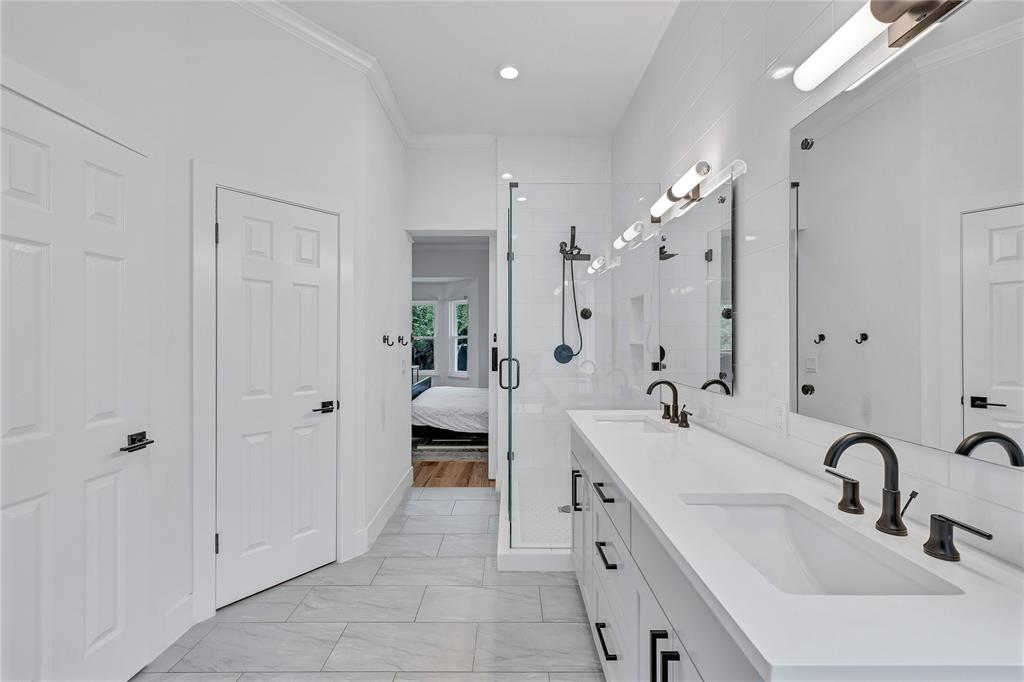 3600 Rip Ford Drive Austin, TX 78732 - Photo 23 of 32 a bathroom with a double vanity sink mirror and shower