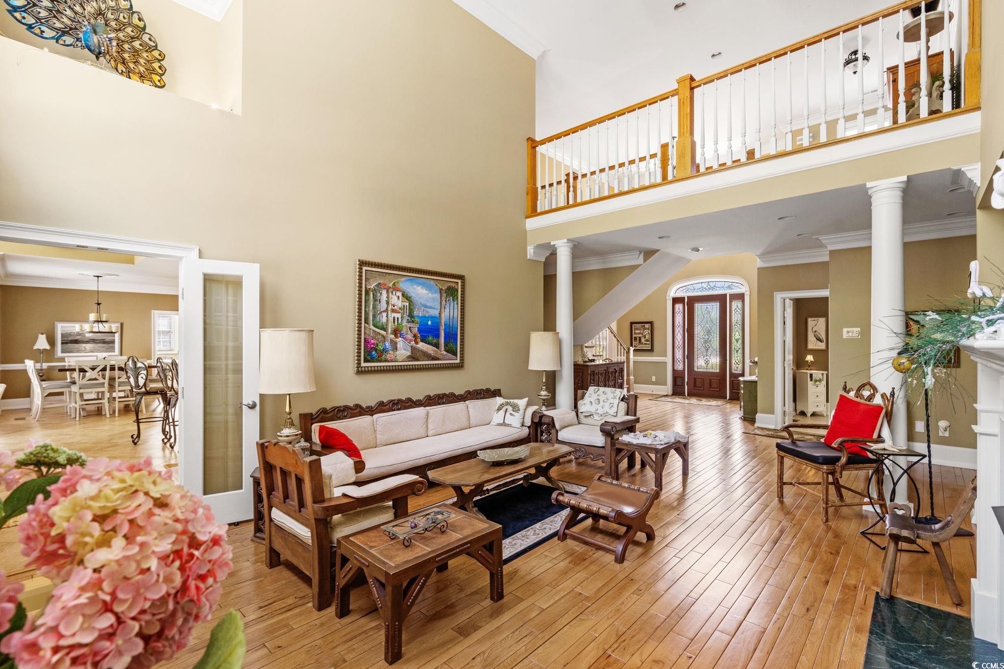 1119 Links Road Myrtle Beach, SC 29575 - Photo 8 of 40 Living room featuring ornate columns, crown moldin