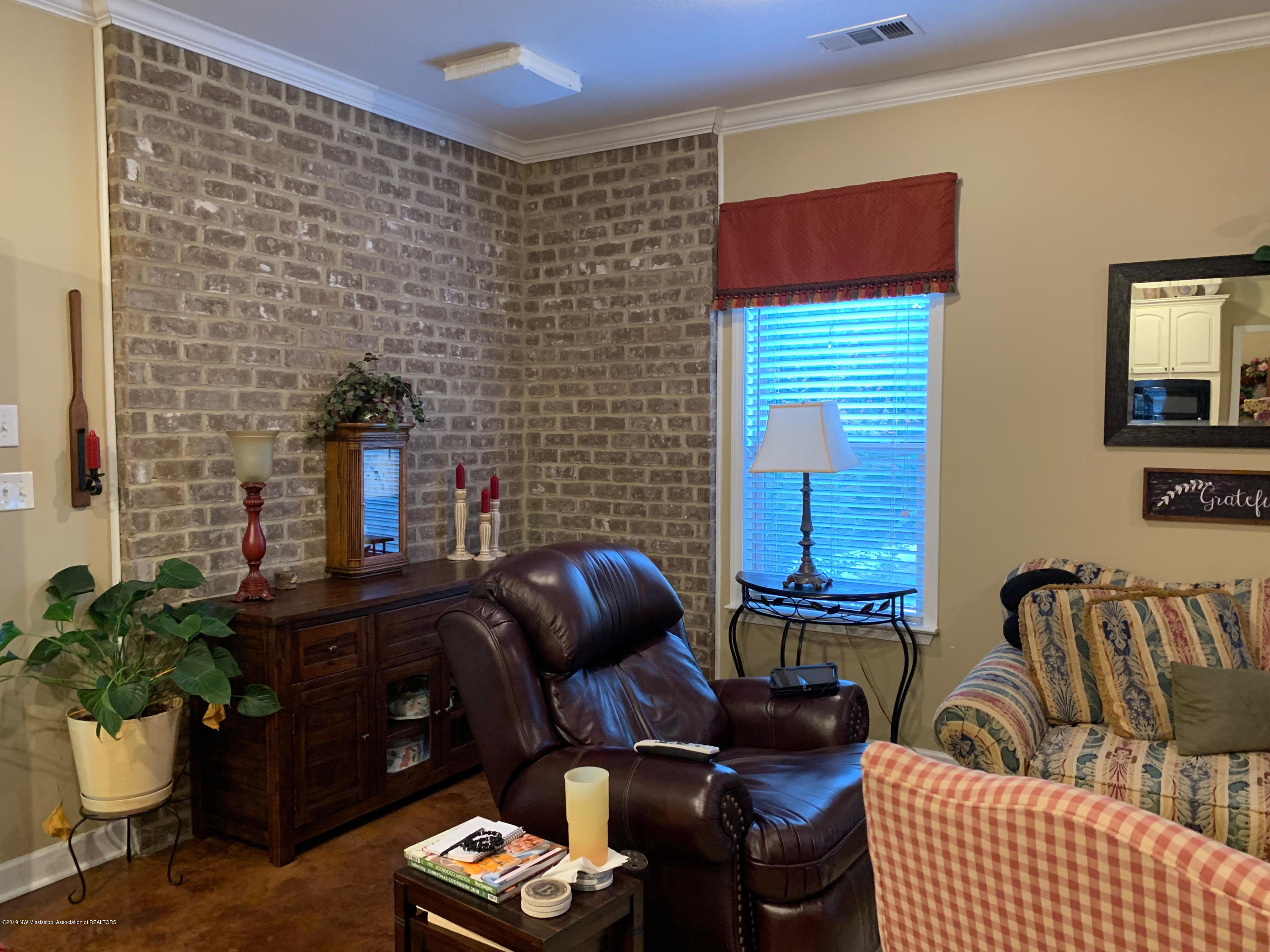701 Gaines Road Hernando, MS 38632 - Photo 20 of 20 brick wall accent in living room