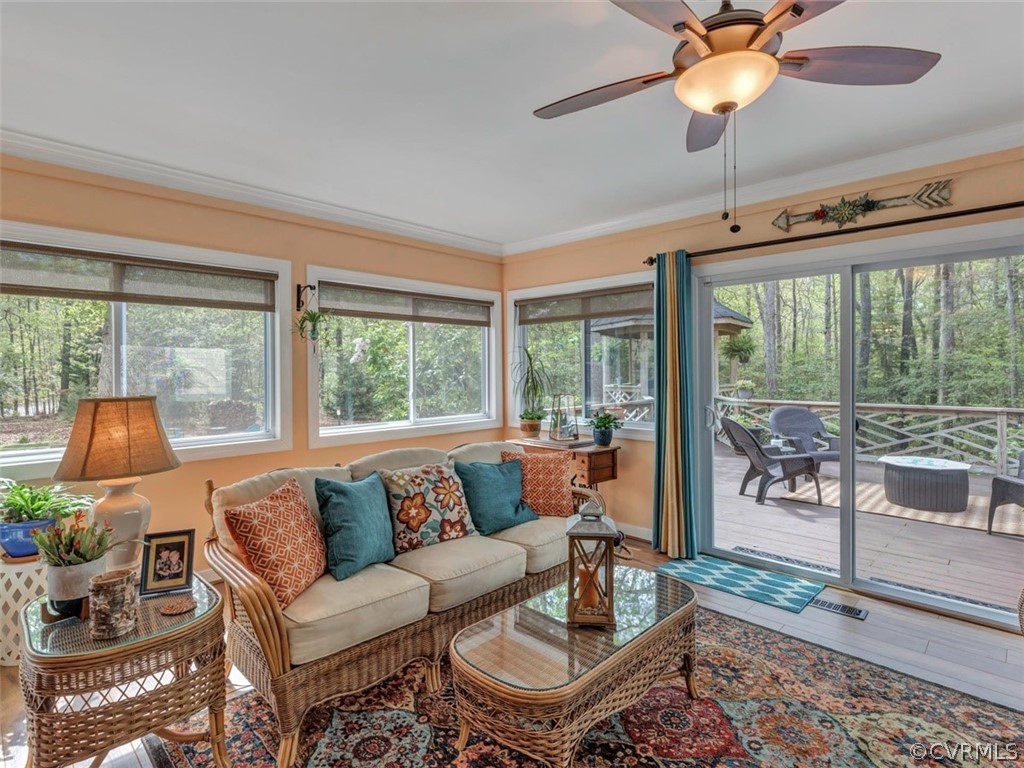 5901 Turkey Oak Road Chester, VA 23831 - Photo 16 of 49 a living room with furniture and a large window