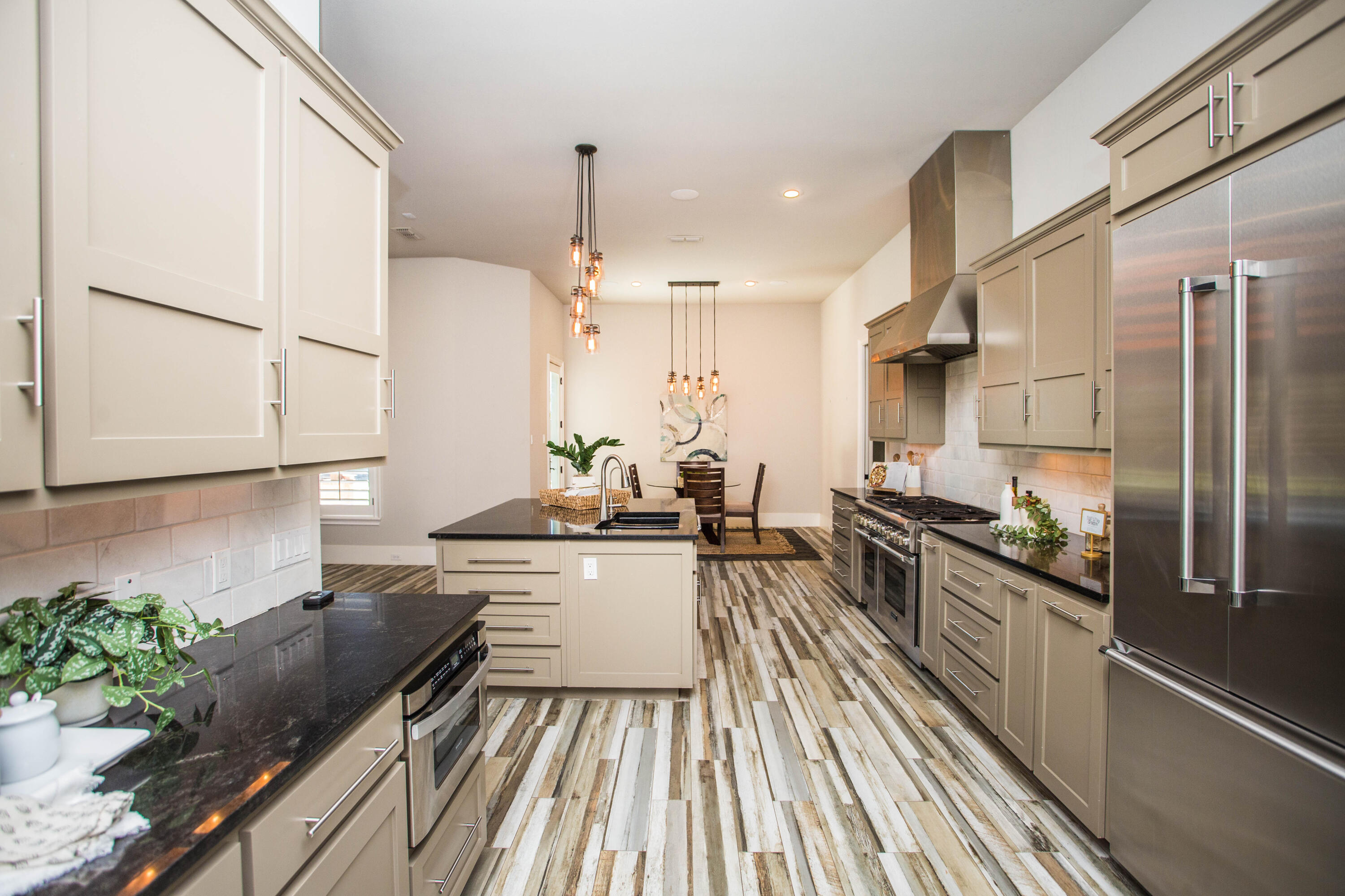 4807 116th Street Lubbock, TX 79424 - Photo 18 of 51 a kitchen with sink stove and refrigerator