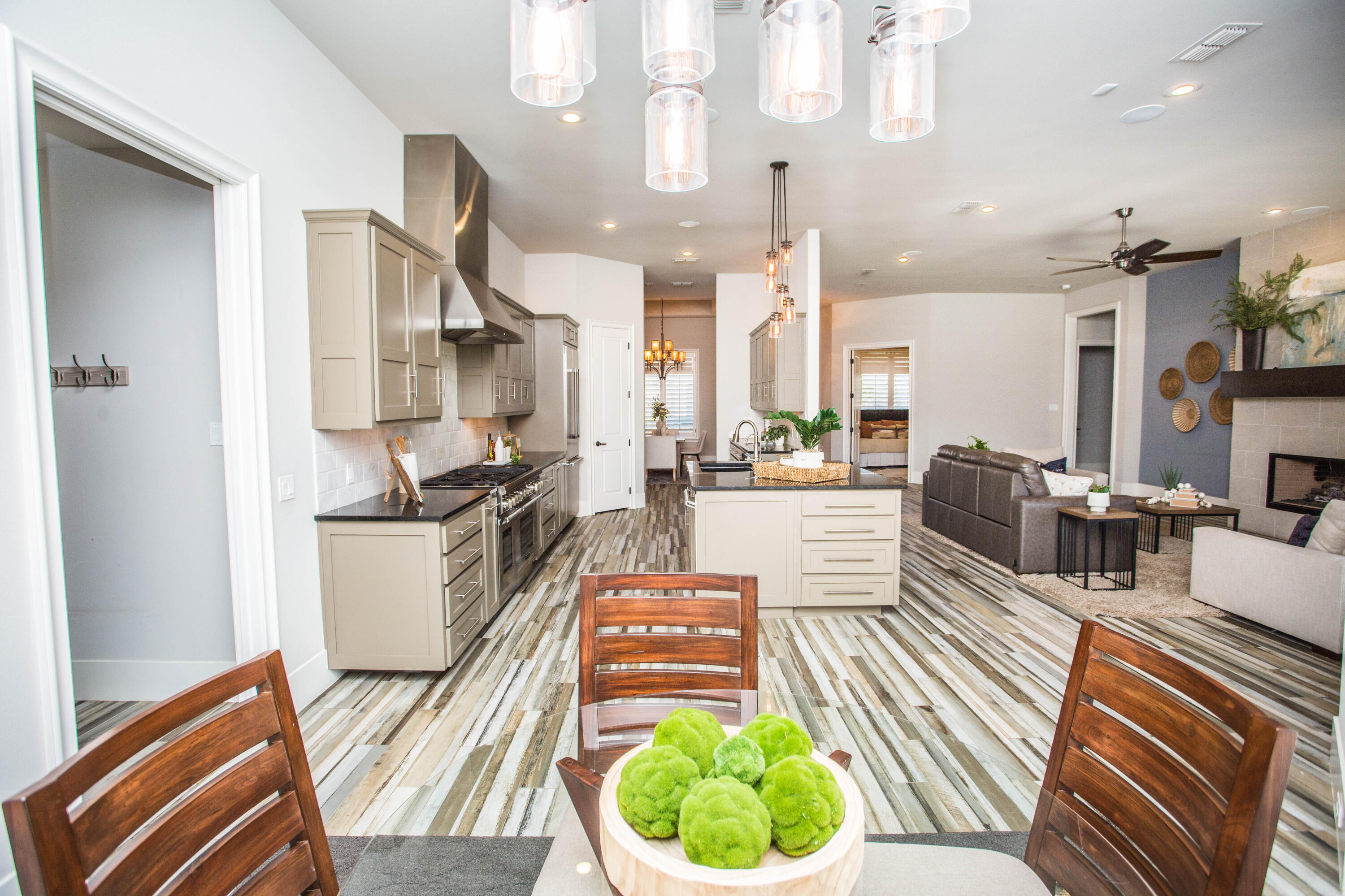 4807 116th Street Lubbock, TX 79424 - Photo 20 of 51 a very nice looking open dining room with kitchen view and a chandelier