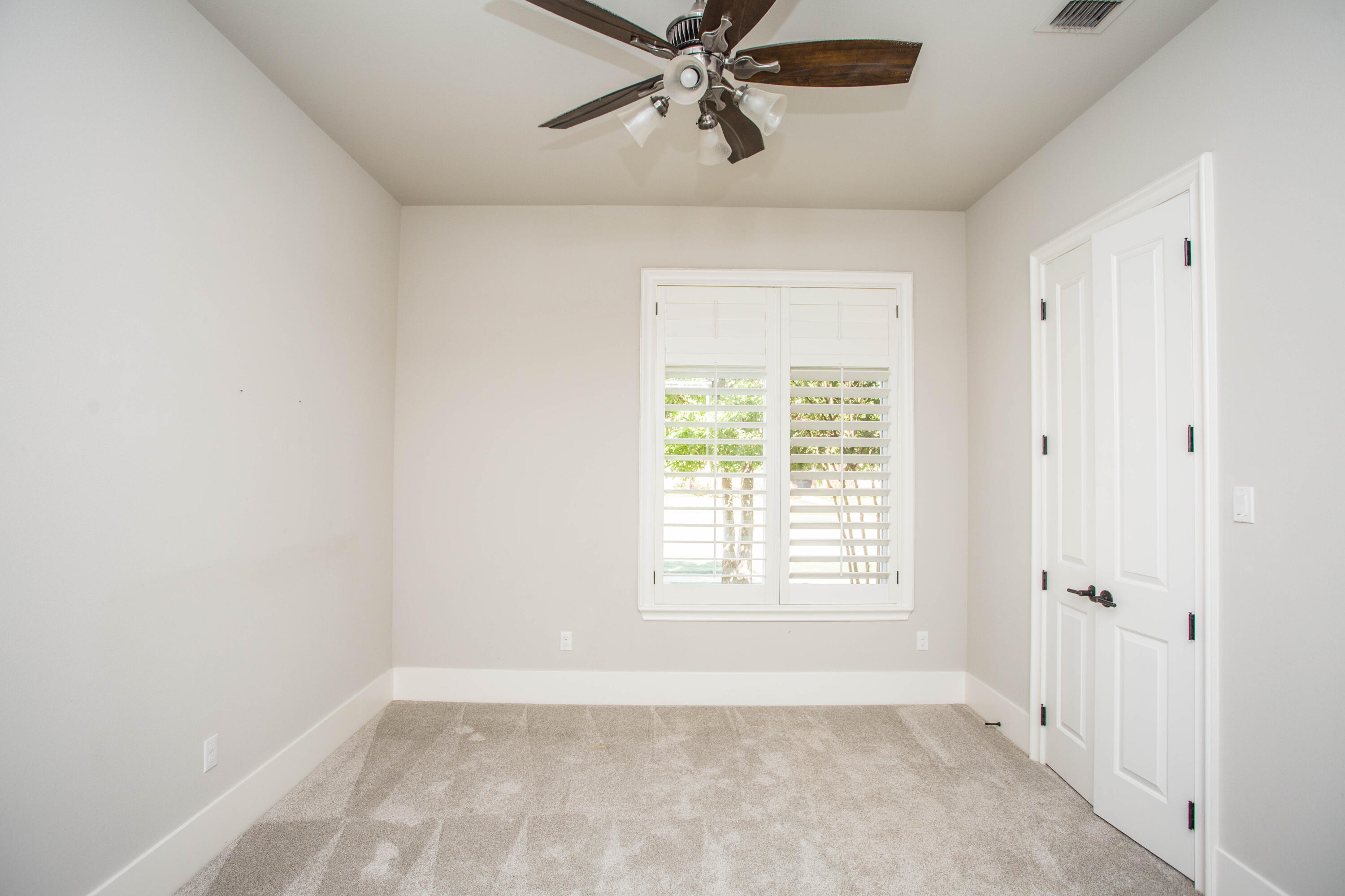 4807 116th Street Lubbock, TX 79424 - Photo 32 of 51 a view of an empty room with a window