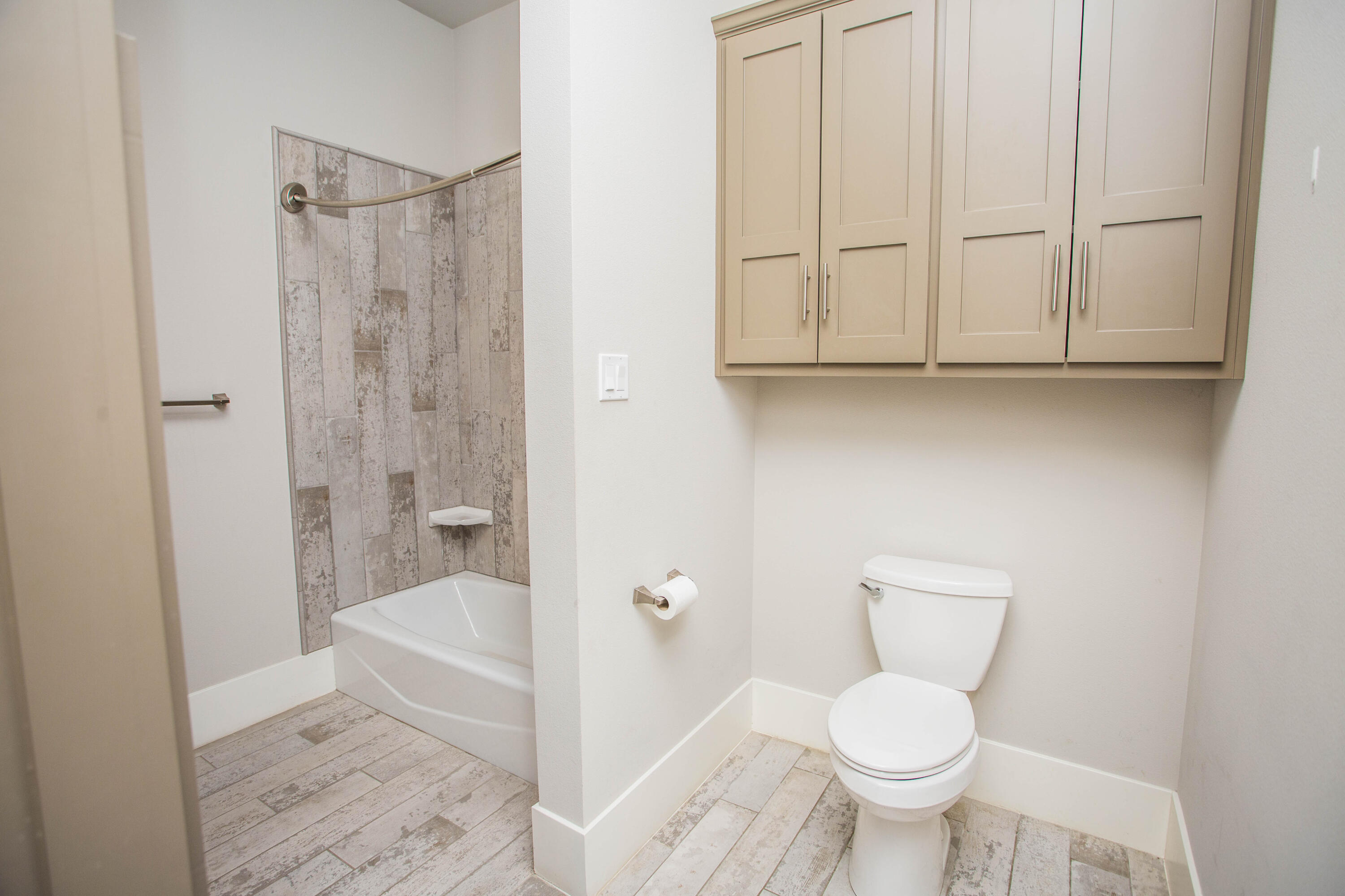 4807 116th Street Lubbock, TX 79424 - Photo 35 of 51 a bathroom with a toilet and a shower