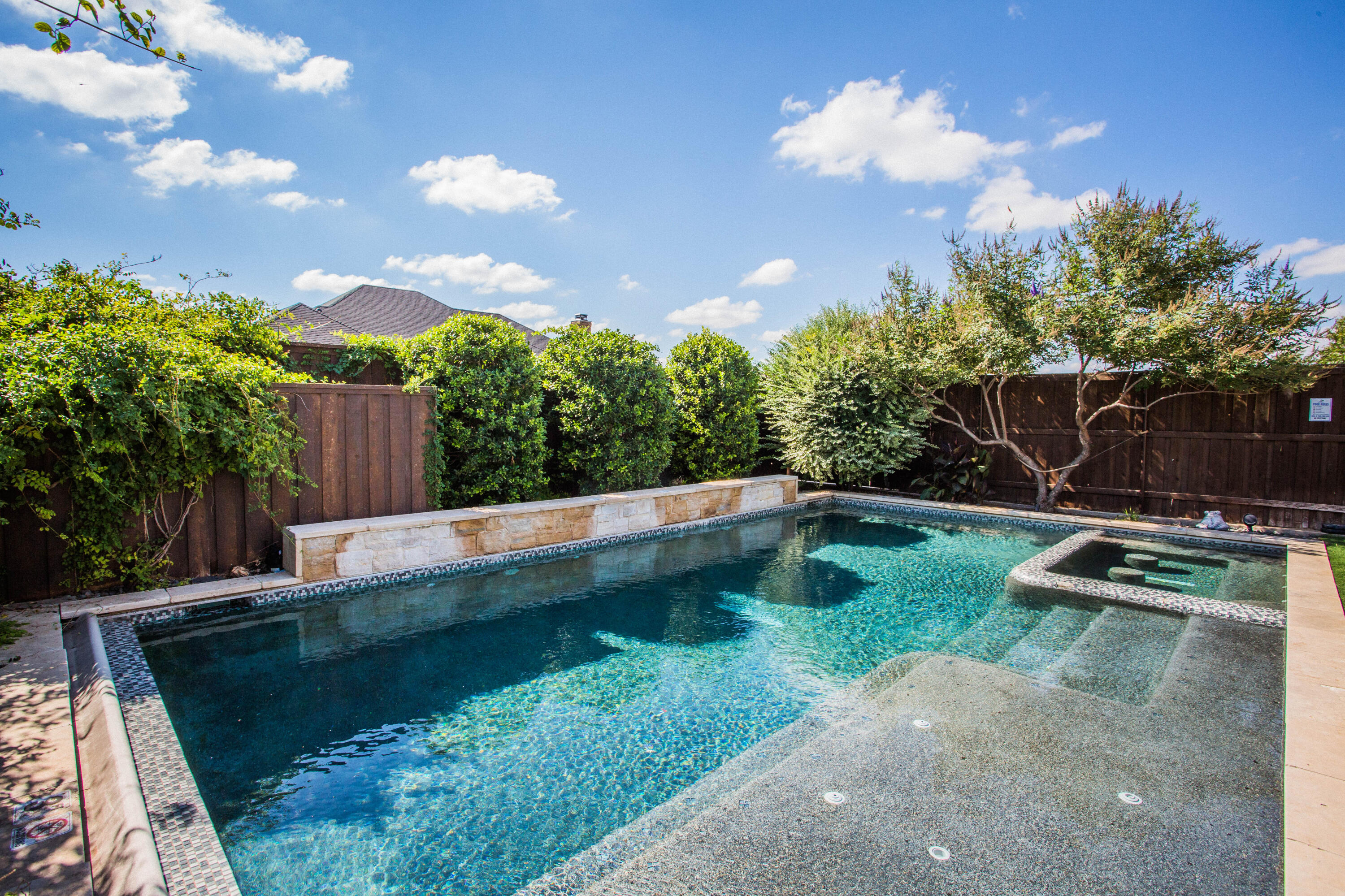4807 116th Street Lubbock, TX 79424 - Photo 49 of 51 a view of a backyard with swimming pool