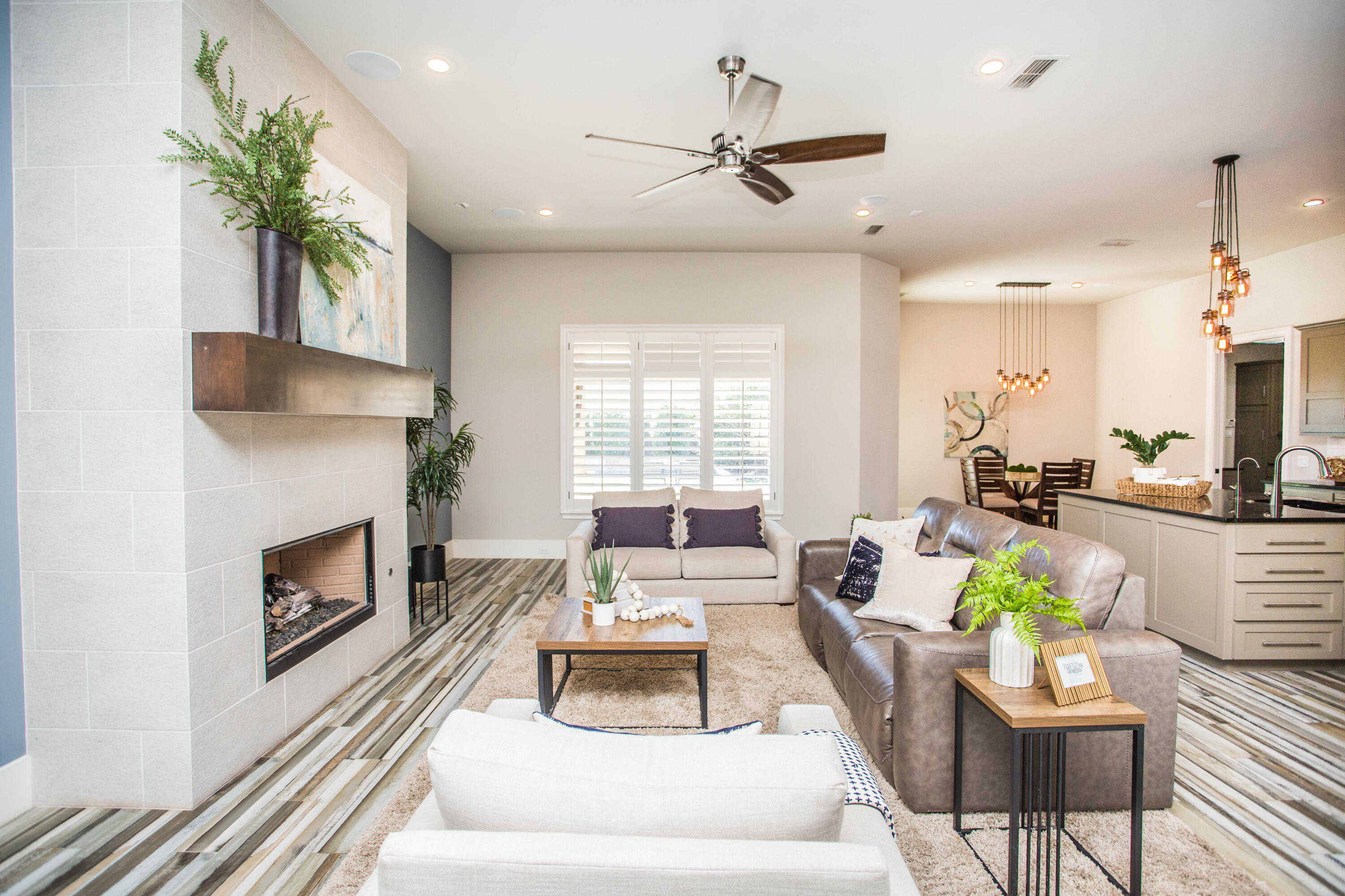 4807 116th Street Lubbock, TX 79424 - Photo 8 of 51 a living room with furniture and a fireplace