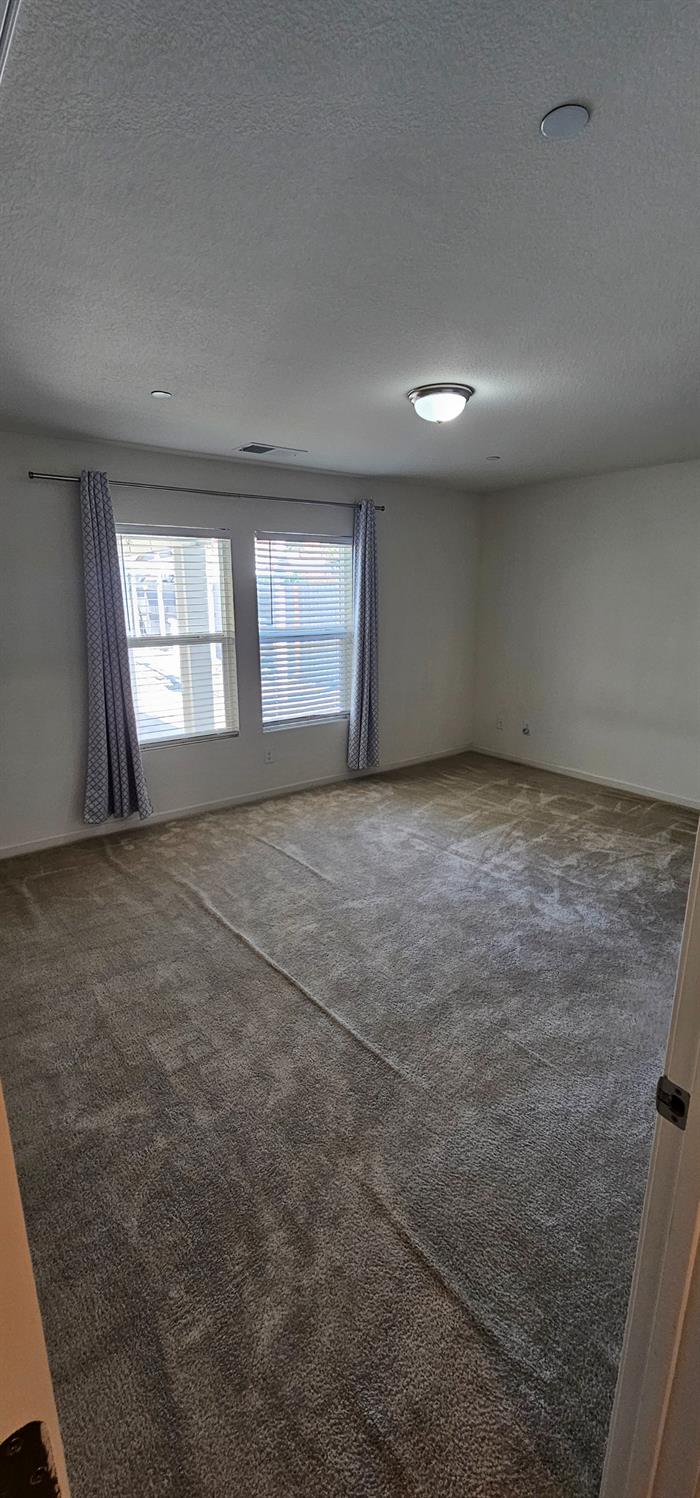 9290 Brock Court Live Oak, CA 95953 - Photo 16 of 29 an empty room with windows