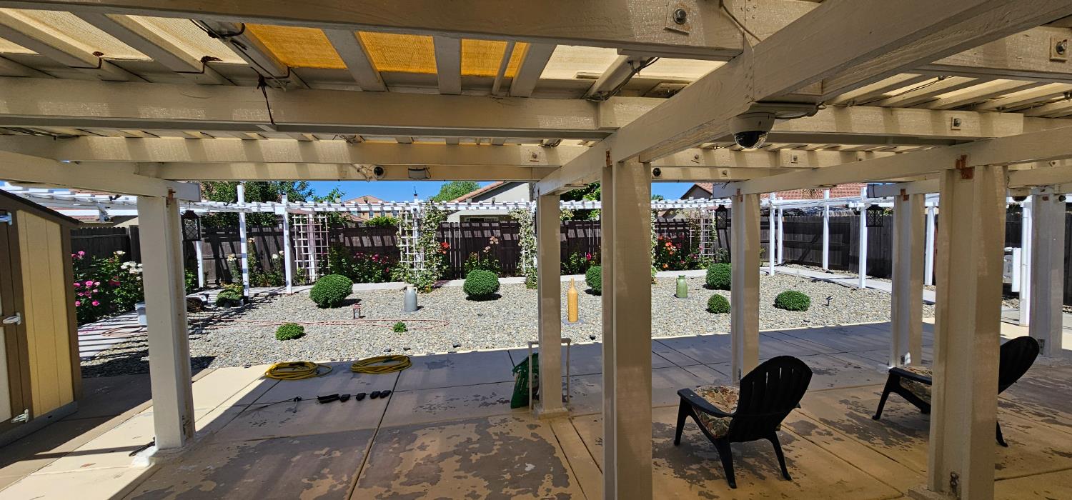 9290 Brock Court Live Oak, CA 95953 - Photo 21 of 29 a outdoor space with lots of furniture and glass windows