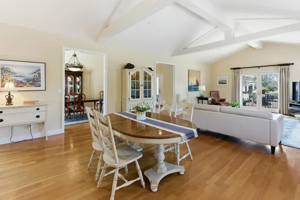 a kitchen with granite countertop a stove and a refrigerator