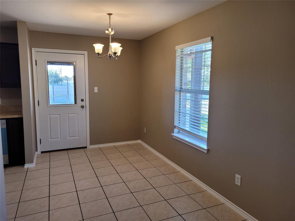 3006 Ruidosa Avenue Dallas, TX 75228 - Photo 9 of 9 a view of an empty room with window