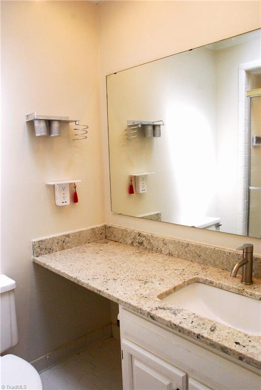 5105 Tower Road Greensboro, NC 27410 - Photo 17 of 25 Primary bath