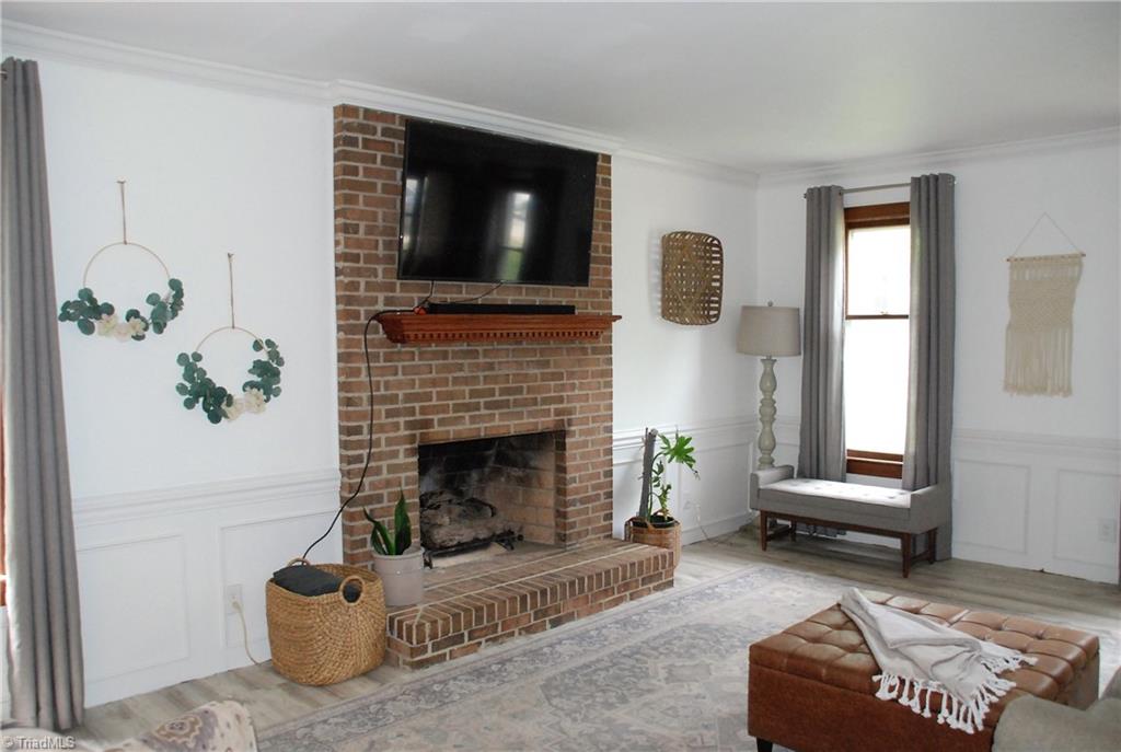 5105 Tower Road Greensboro, NC 27410 - Photo 3 of 25 Fireplace with gas logs