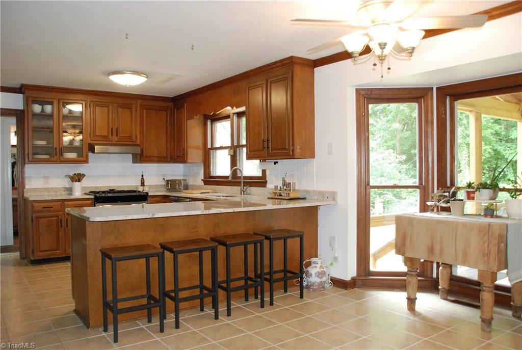 5105 Tower Road Greensboro, NC 27410 - Photo 5 of 25 Kitchen with new granite counters