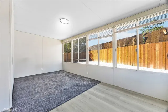 a view of an empty room and window