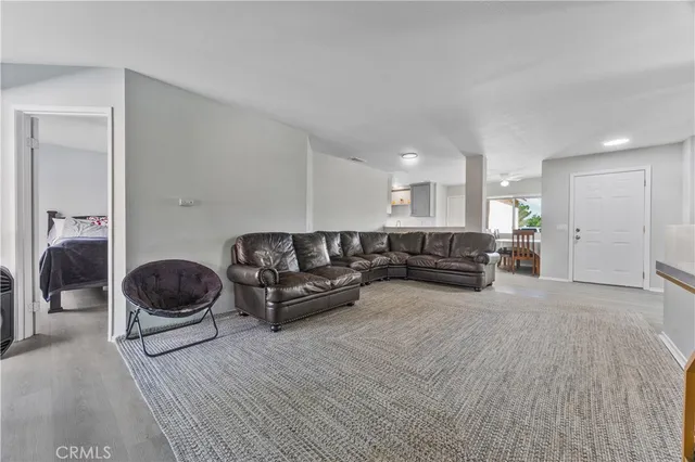 a living room with furniture and a couch