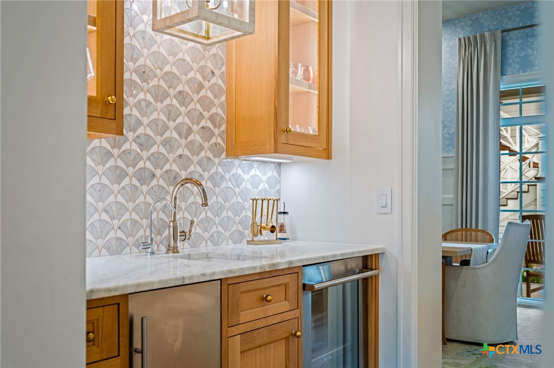 1755 Riada Drive New Braunfels, TX 78132 - Photo 16 of 48 a kitchen with a sink and a window