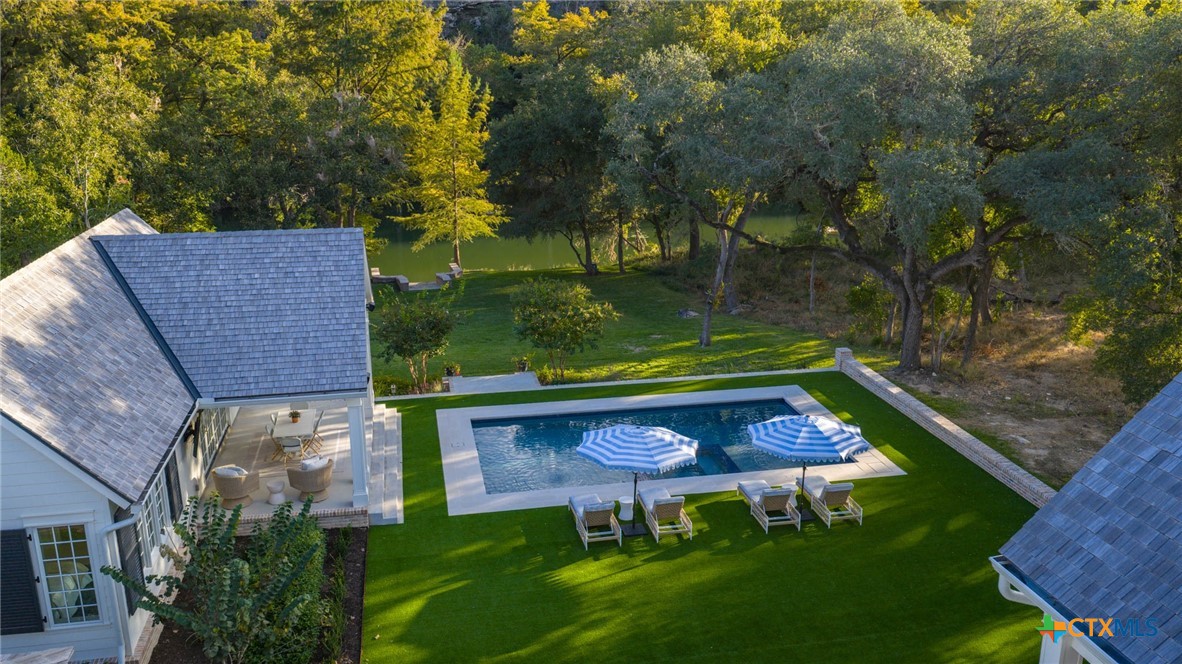 1755 Riada Drive New Braunfels, TX 78132 - Photo 3 of 48 an aerial view of a chairs and table in the patio