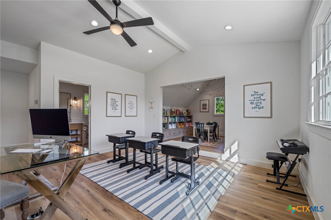 1755 Riada Drive New Braunfels, TX 78132 - Photo 45 of 48 a living room with furniture and a flat screen tv