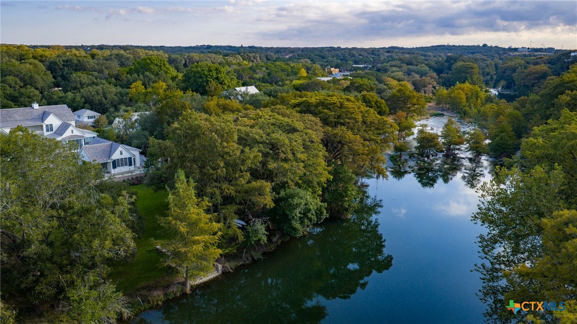 1755 Riada Drive New Braunfels, TX 78132 - Photo 47 of 48 a view of a lake with a city
