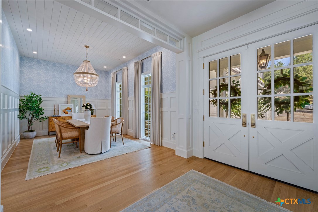 1755 Riada Drive New Braunfels, TX 78132 - Photo 6 of 48 a view of a dining room with furniture window and wooden floor