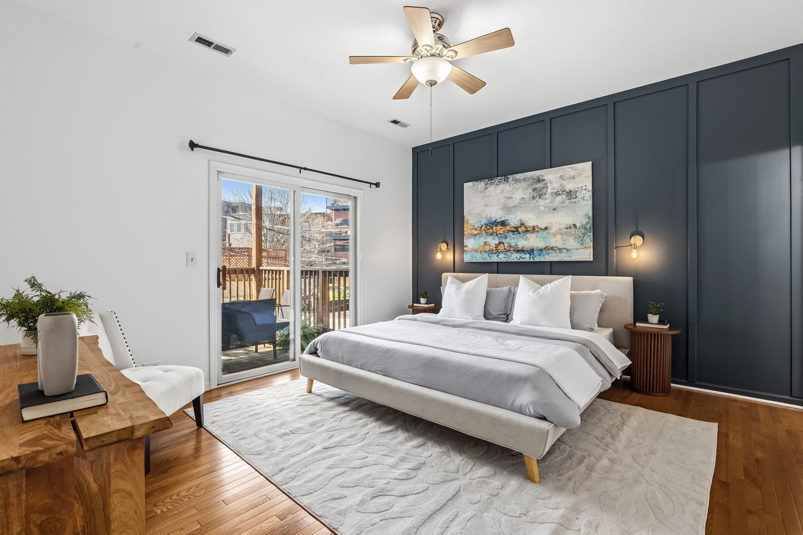 909 West Roscoe Street, Unit 2 Chicago, IL 60657 - Photo 11 of 22 a bedroom with a large bed and a window