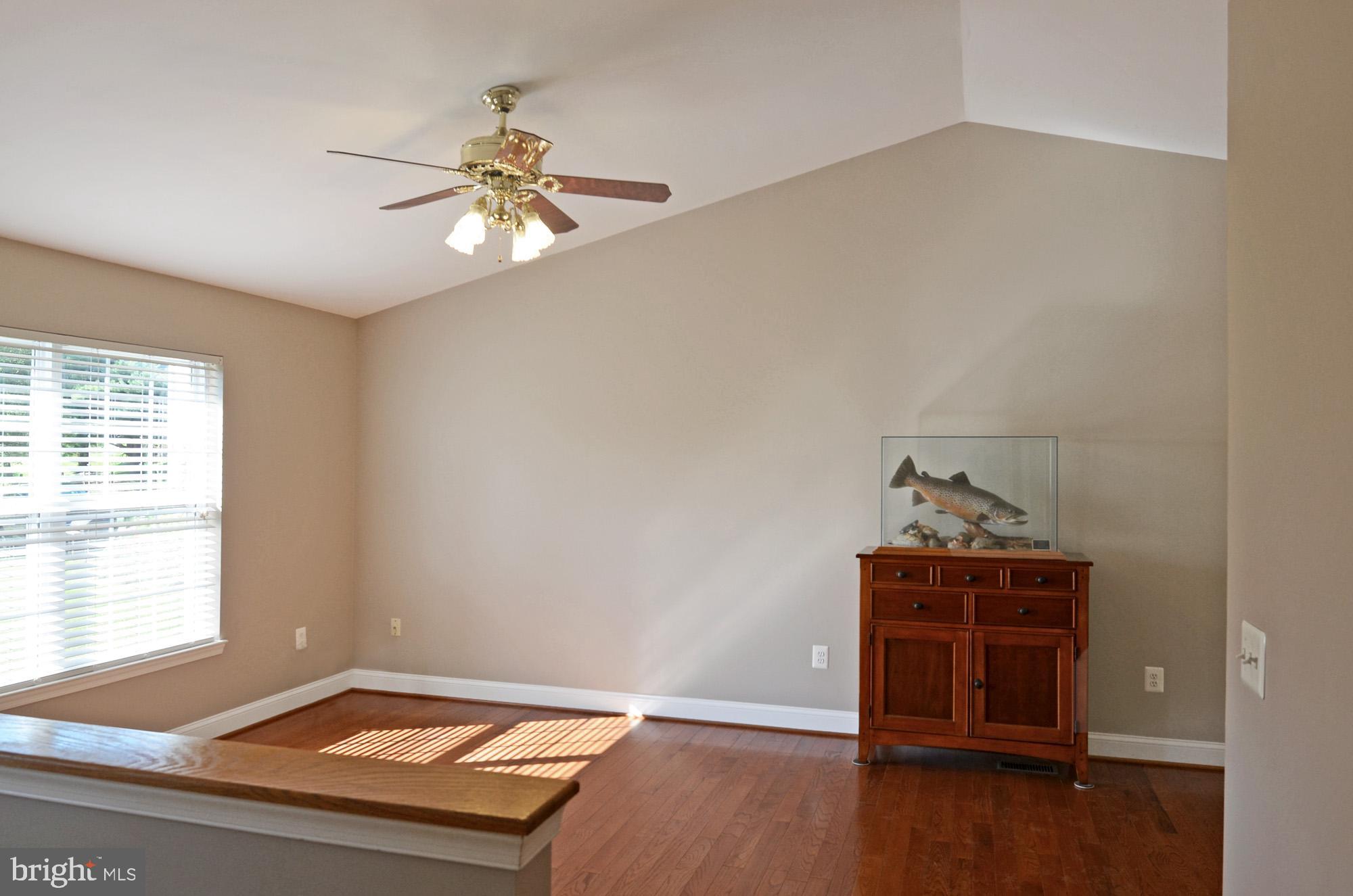 8112 Rugby Road Manassas, VA 20111 - Photo 17 of 38 Living room with cathedral ceiling