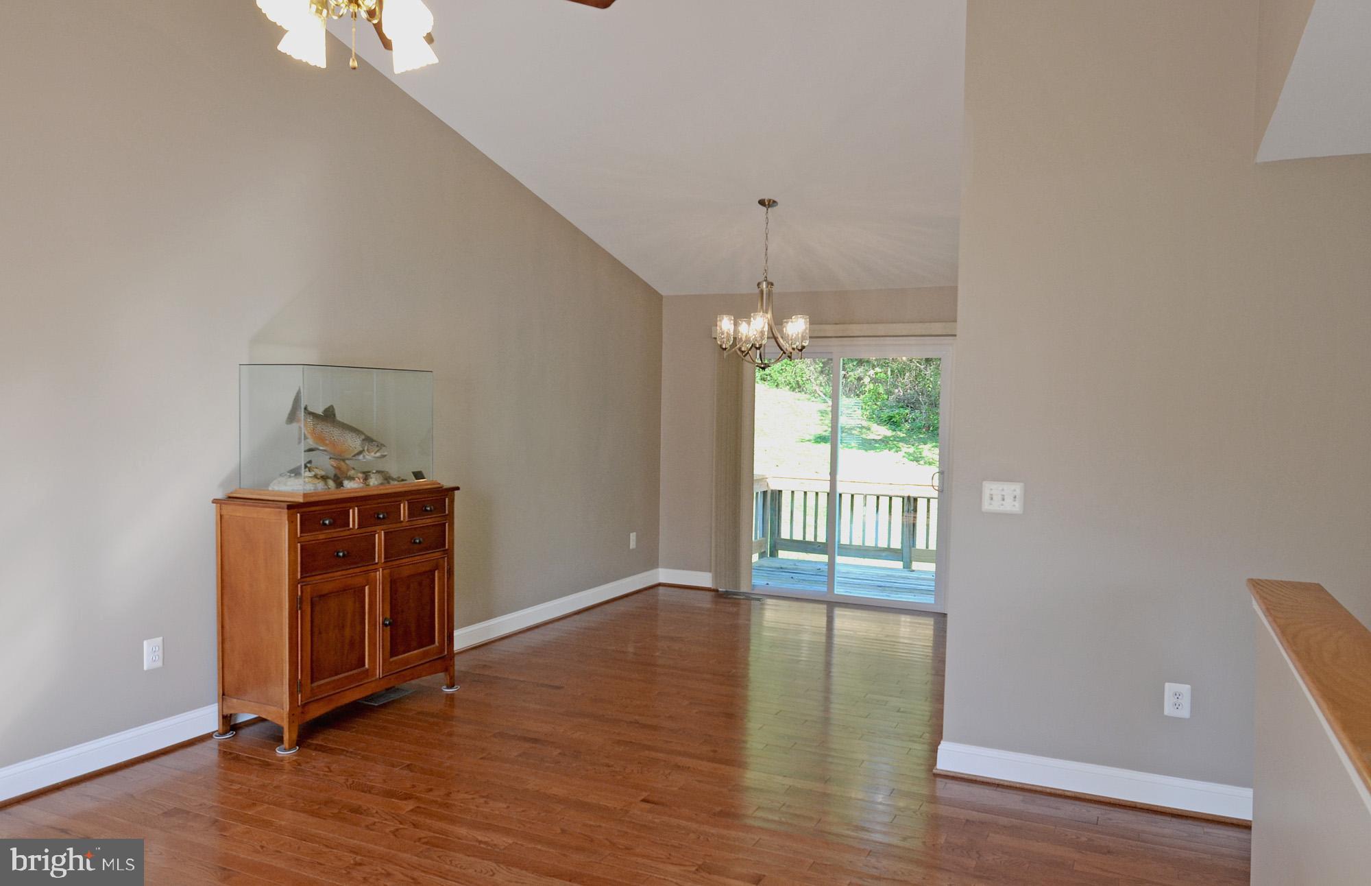 8112 Rugby Road Manassas, VA 20111 - Photo 18 of 38 Gleaming hardwood floors extend to the DR