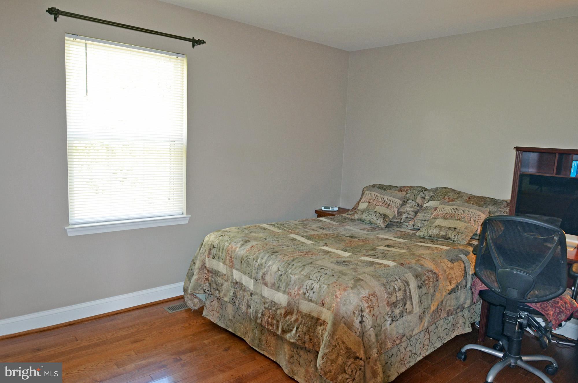 8112 Rugby Road Manassas, VA 20111 - Photo 25 of 38 Owner's bedroom with hardwood floor