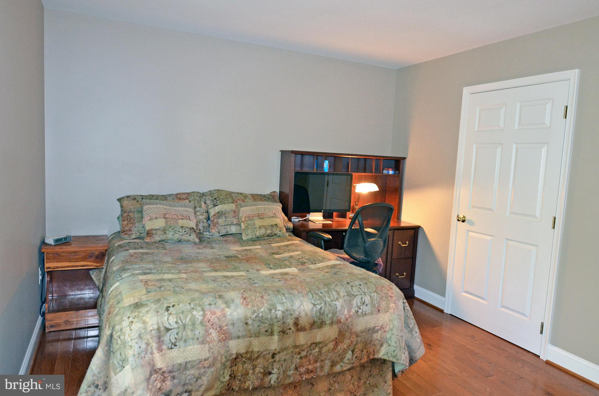 8112 Rugby Road Manassas, VA 20111 - Photo 26 of 38 Owner's bedroom with hardwood floor