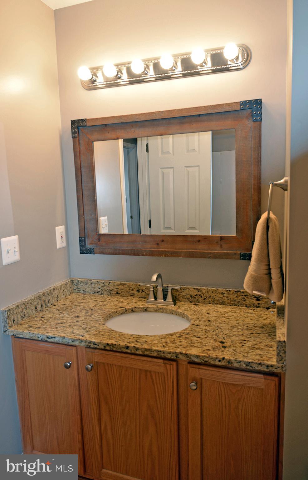 8112 Rugby Road Manassas, VA 20111 - Photo 35 of 38 Hall BA w/vanity w/granite counter