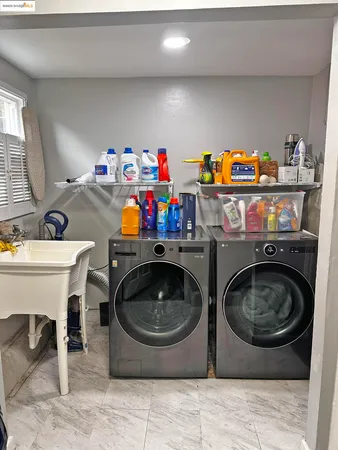 a utility room with dryer and washer