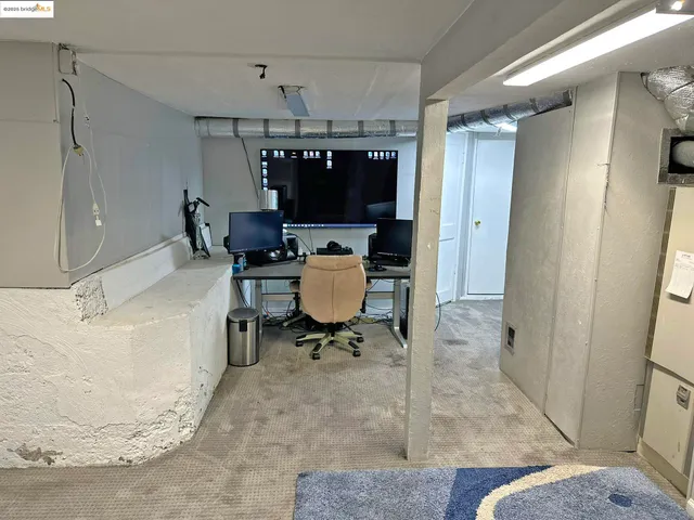 a workspace with furniture and a rug