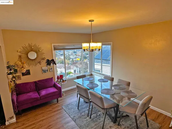 a view of a livingroom with furniture and window