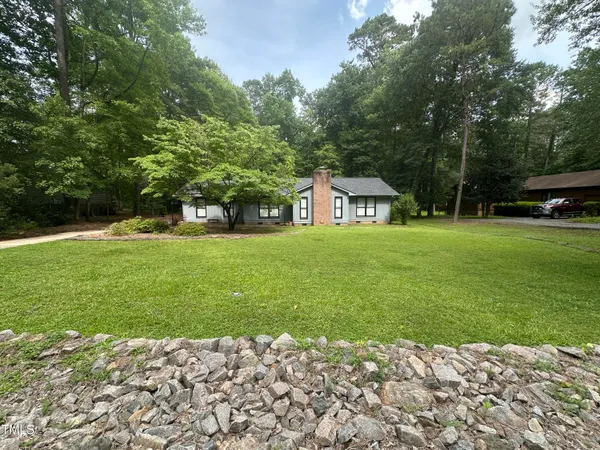 a house view with a garden space