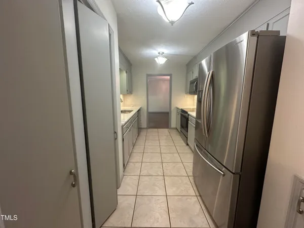 a bathroom with a sink a toilet and a shower