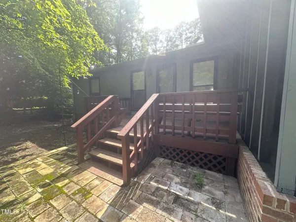 a view of a porch with a bench