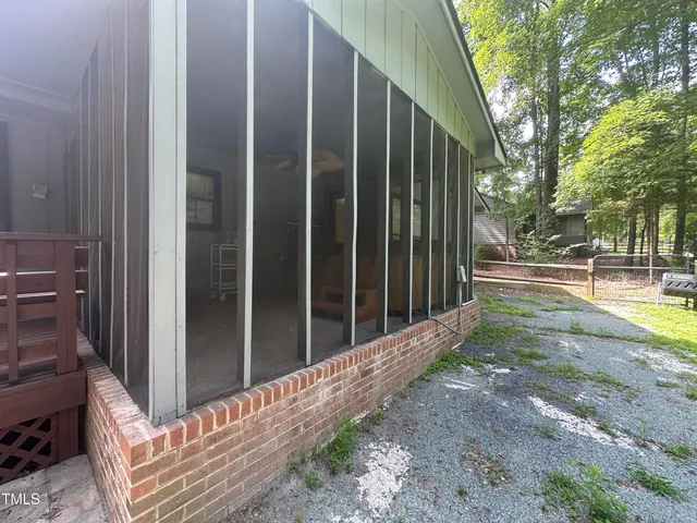 a view of backyard with green space