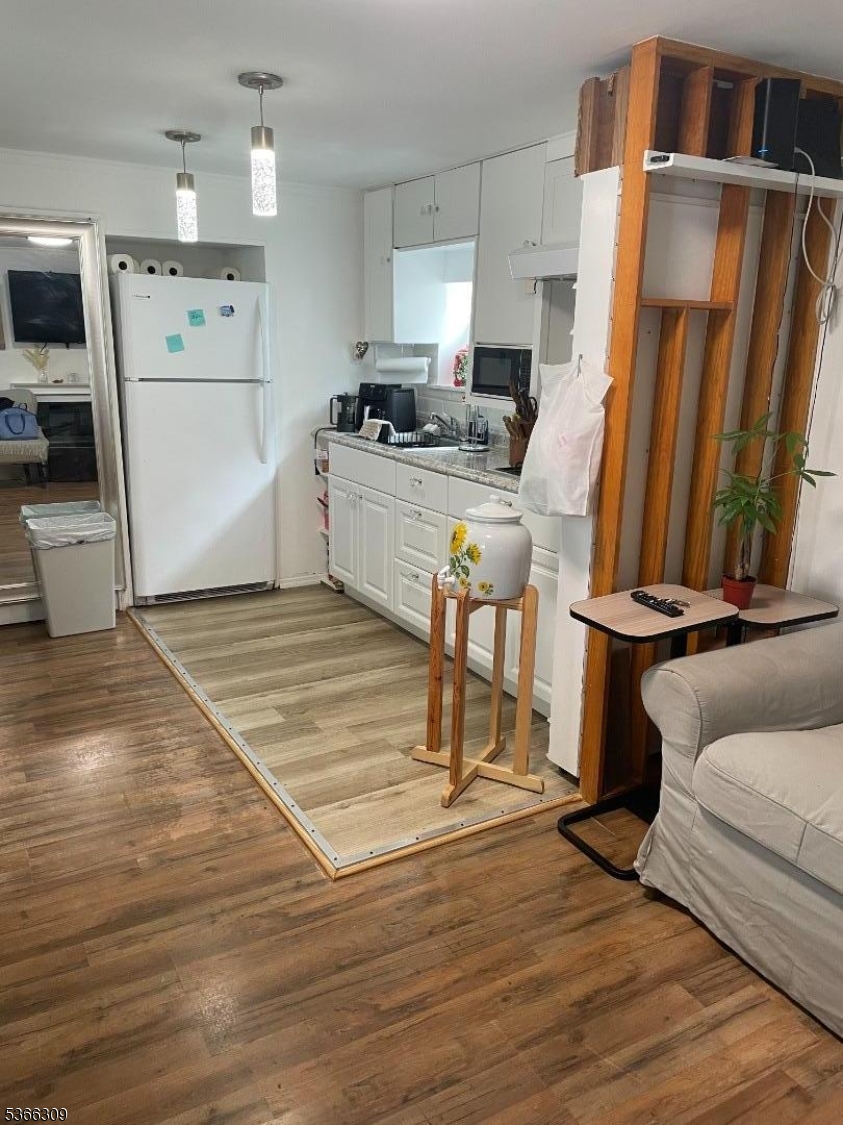 16 Sale Street Moonachie, NJ 07074 - Photo 1 of 13 a kitchen with a sink appliances and cabinets