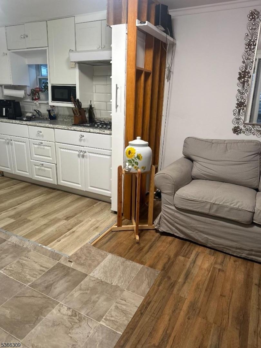 16 Sale Street Moonachie, NJ 07074 - Photo 2 of 13 a kitchen with a sink cabinets and window