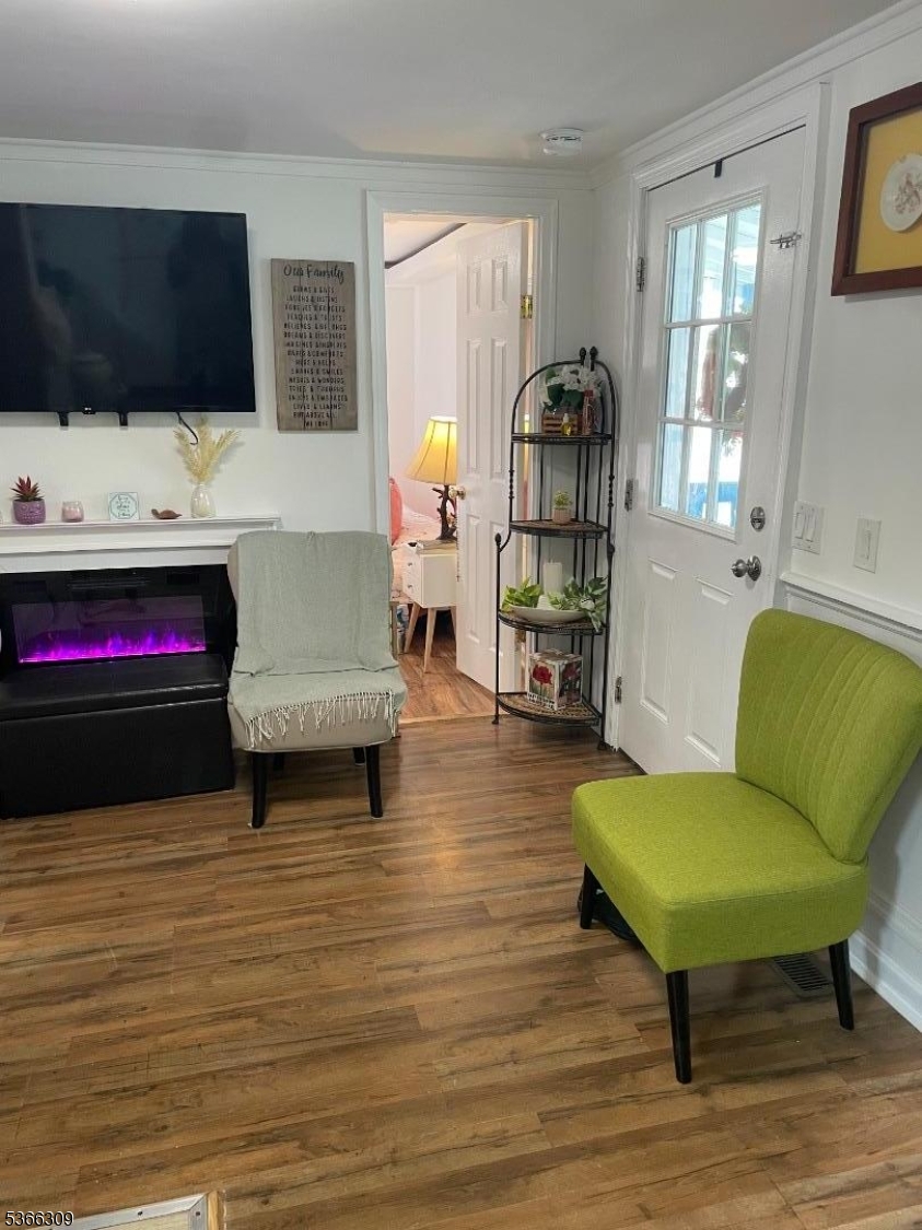 16 Sale Street Moonachie, NJ 07074 - Photo 7 of 13 a living room with furniture and a flat screen tv