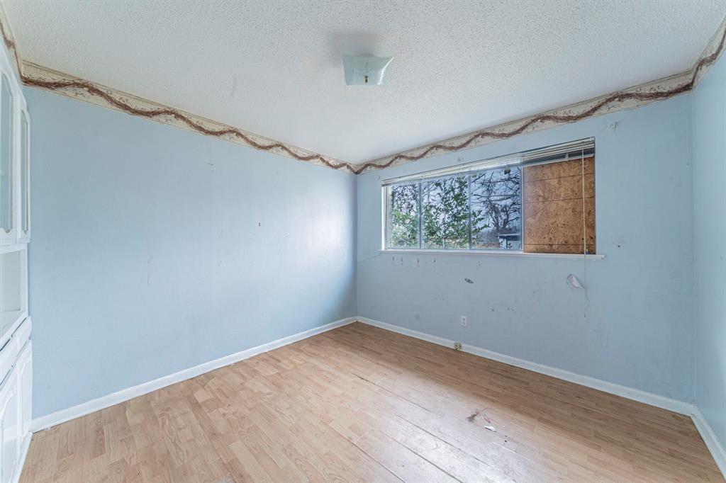 3816 Springbranch Drive Benbrook, TX 76116 - Photo 12 of 27 a view of room with window and hardwood floor